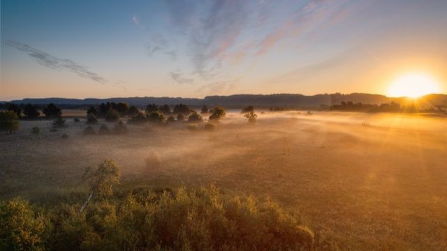 Misty Peak District landscape at sunrise, reflecting the natural palette behind Scandinavian design