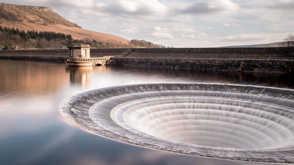 Ladybower Reservoir plughole overflow in the Peak District, scenic landscape near Sheffield used for campervan travel inspiration