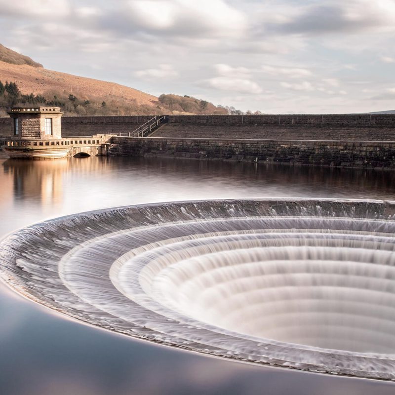 Ladybower Reservoir plughole overflow in the Peak District, scenic landscape near Sheffield used for campervan travel inspiration