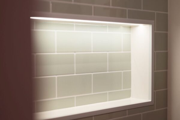 Tiled backsplash detail in the kitchen area of a Bhode campervan conversion
