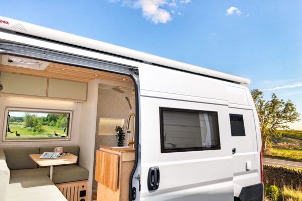 Luxury campervan conversion with fixed rear bed, shower room and side loading door